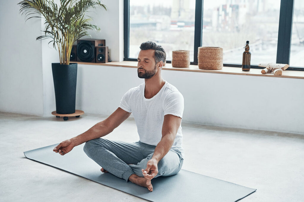 man doing yoga